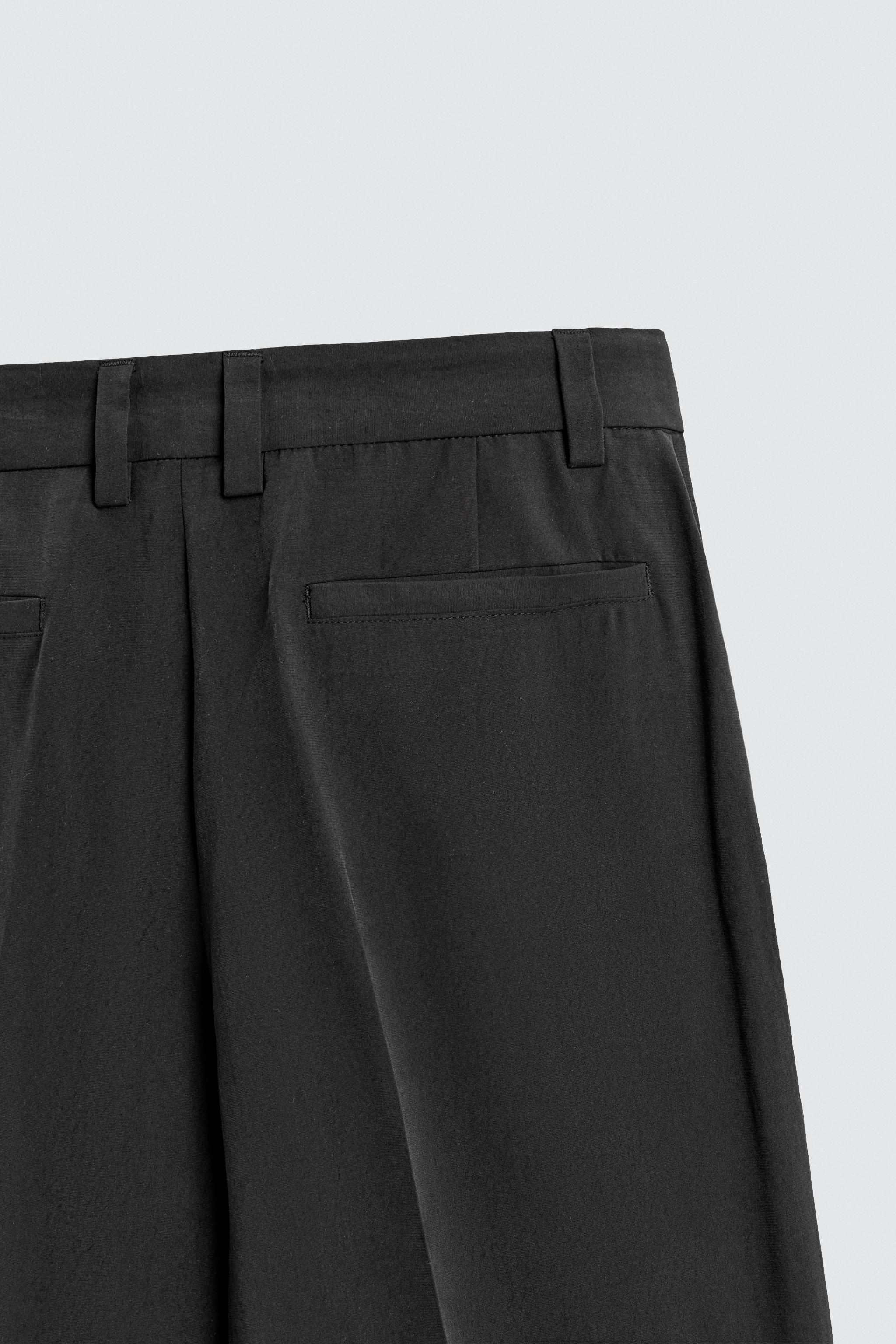 RELAXED FIT FLOWY PANTS